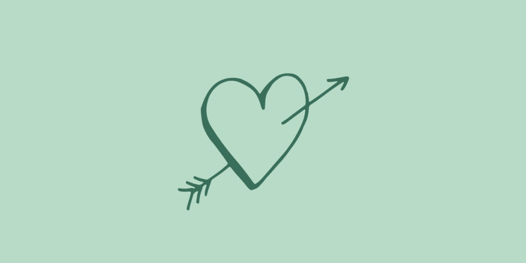 Grafisk illustration af hjerte med pil igennem - symbol på forelskelse og ægte kærlighed